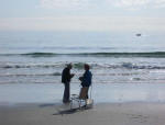 Daddy and Mother making surf fishing preparations.