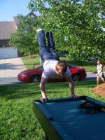 David - Handstand on pooltable - series of 4 photos