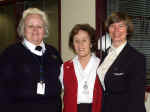 Sharon and Rita greet Ruth at Immigration