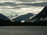 On the Olympic Peninsula at the northern end of Grays Harbor County, the Quinault Rain Forest frames the Quinault Valley with ridges that rise over 3,000 feet.