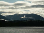 Lake Quinaults clear, clean, glacier fed waters lapped at the beach bordering the back yard of our little lakeside chalet.