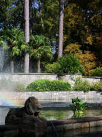 The misty rainbow spray accentuates Renaissance Gardenspouting lion, vista, terraces, stone fences, statues of the seasons, reflecting pool, and fountain.