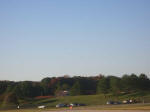 Glimpse of Baker Hall Visitor Center taxiing; Norfolk's Botanical Garden is located on the airport grounds.