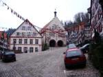 Market place. A beautiful 1594 town hall, impressive central landmark Rathaus Schiltach, its painted facade depicting the village history.