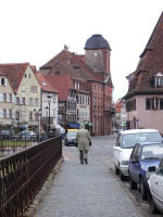 From the abbey, Joe heads towards picturesque Patrician houses and the town hall. Off to the left stands the home of the Bartholdi Family whose famous sculptor descendant gave the French their Lion de Belfort & Americans their Statue of Liberty. 