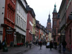 Looking up the main pedestrian thoroughfare towards the Holy Ghost Church (Heiliggeistkirche), its gallery once a safe haven for the famous Palatine Library of most significant European books, Bibliotheca Palatina.